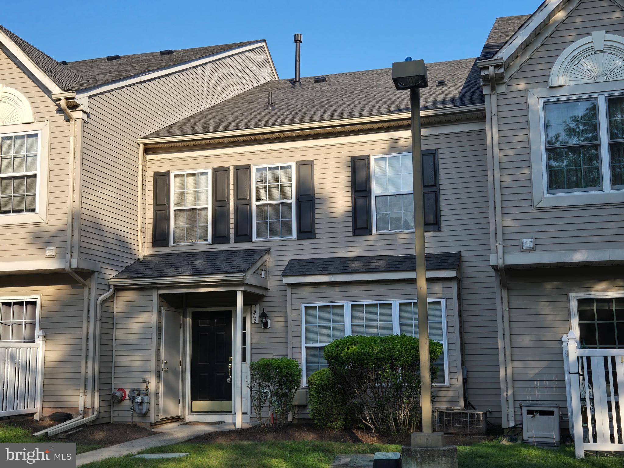 1302 Black Walnut Drive, Unit 1302 Phoenixville, PA 19460 - Photo 1 of 11 Charming townhouse with inviting curb appeal.