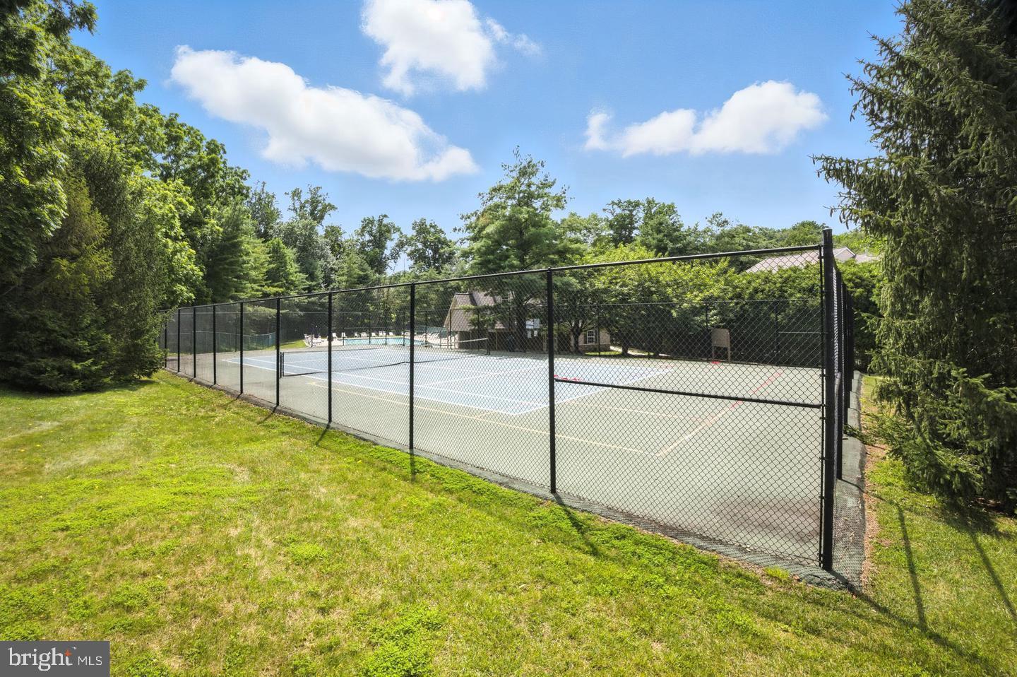 1302 Black Walnut Drive, Unit 1302 Phoenixville, PA 19460 - Photo 11 of 11 Scenic tennis court surrounded by nature.