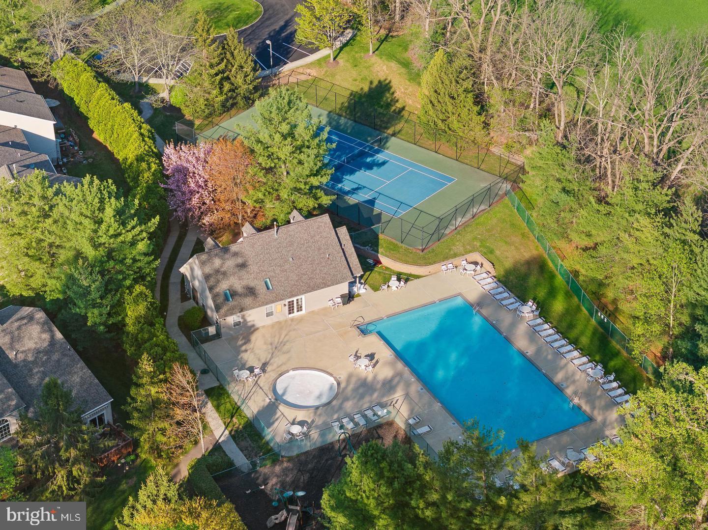 1302 Black Walnut Drive, Unit 1302 Phoenixville, PA 19460 - Photo 9 of 11 Serene retreat with pool and tennis court.