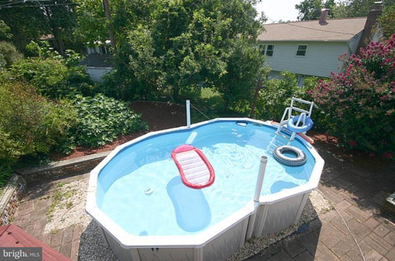 497 St Barbara Lane Odenton, MD 21113 - Photo 21 of 25 a view of entryway with garden