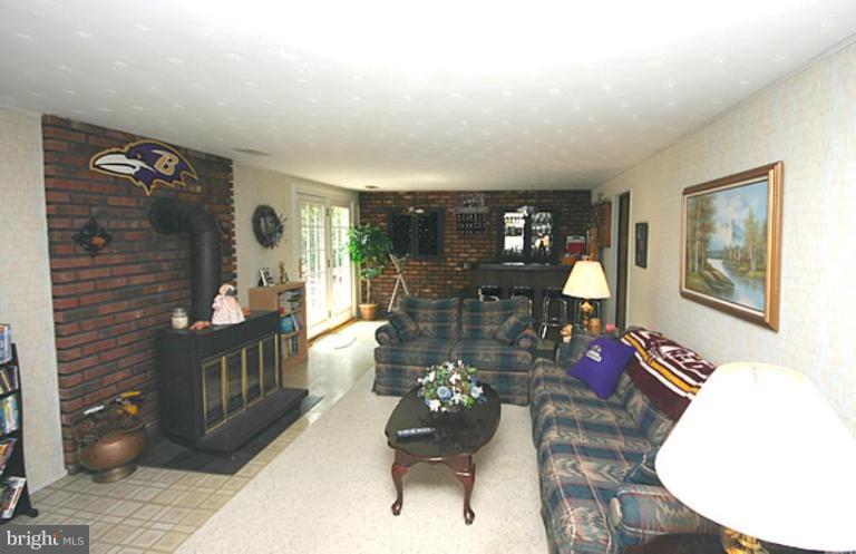 497 St Barbara Lane Odenton, MD 21113 - Photo 8 of 25 a living room with furniture and wooden floor