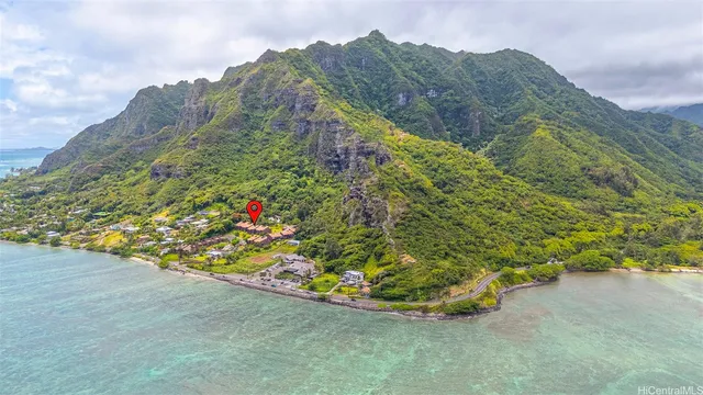 a view of a pathway with a garden