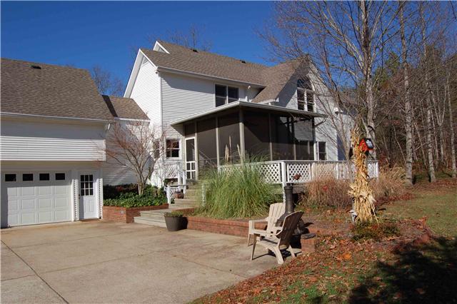 1082 Rip Steele Road Columbia, TN 38401 - Photo 4 of 20 Rear of Home showing the Large Screened Porch & 3 Car Garage.