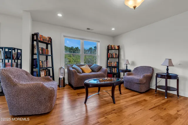 a view of a brick house with a yard