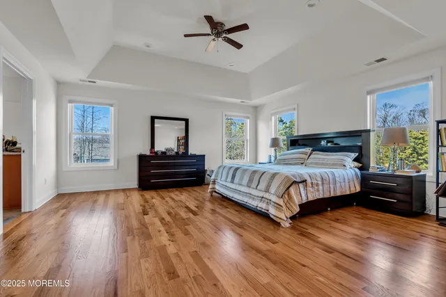 a view of a house with a yard porch and sitting area