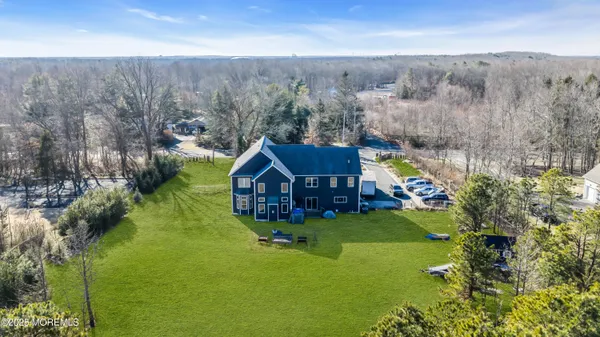 a view of a house with a big yard