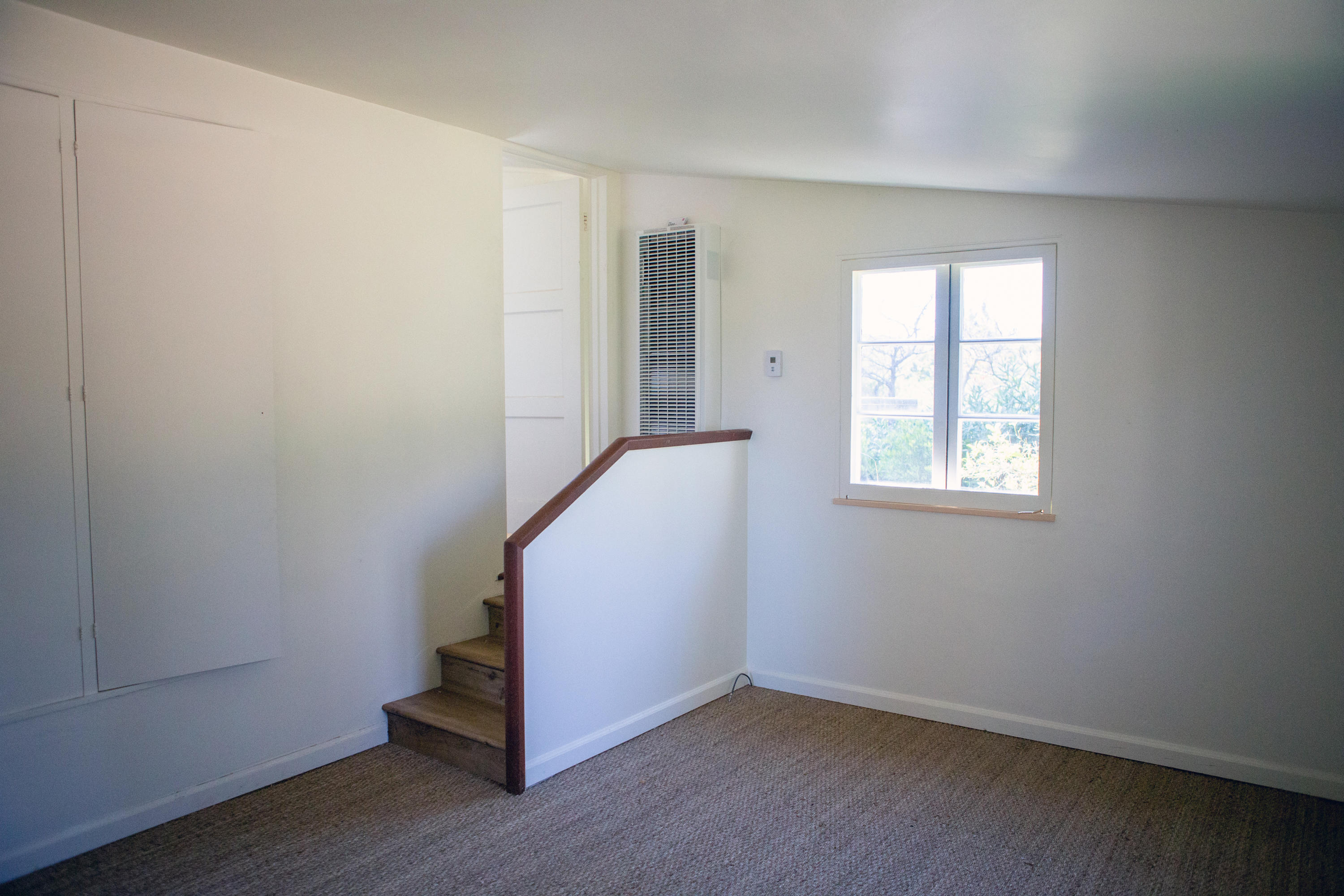 4395 Via Esperanza Santa Barbara, CA 93110 - Photo 17 of 23 an empty room with wooden floor and windows