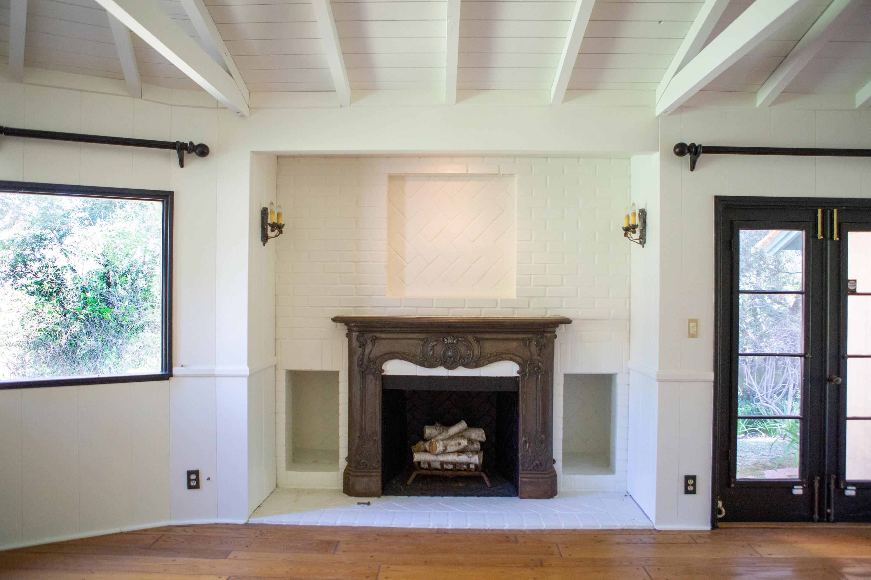 4395 Via Esperanza Santa Barbara, CA 93110 - Photo 8 of 23 a living room with a fireplace and a window