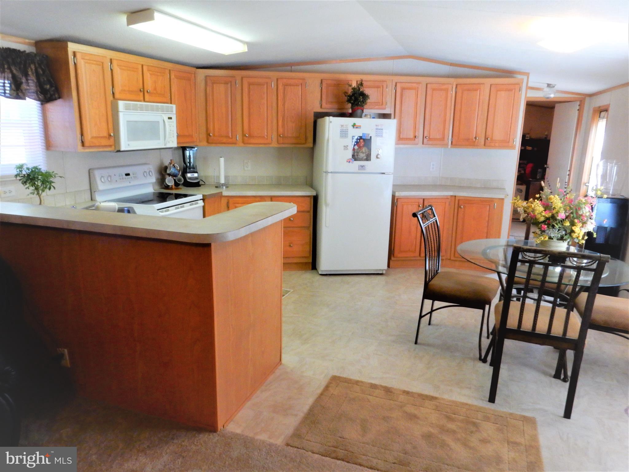 7810 Clark Road Jessup, MD 20794 - Photo 2 of 28 Big Kitchen with Breakfast Bar