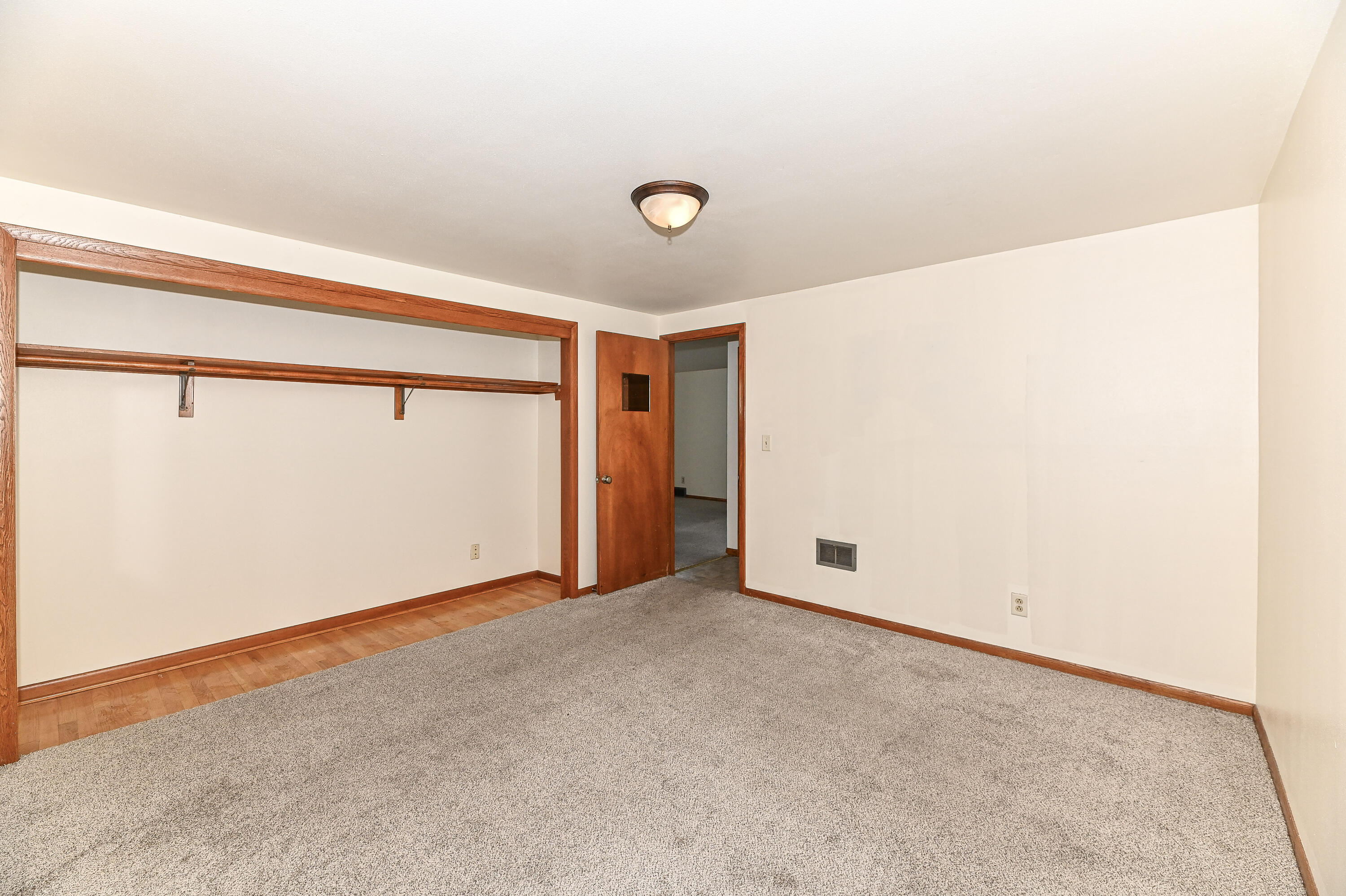 1728 Cleveland Avenue, Unit 1730 Racine, WI 53405 - Photo 25 of 39 Upper Primary Bedroom