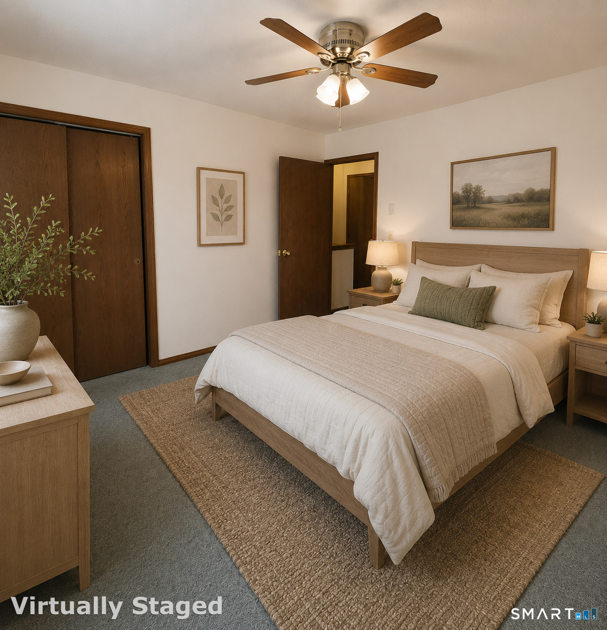975 Meriden Road, Unit 101 Waterbury, CT 06705 - Photo 20 of 28 a bedroom with a large bed and a chandelier
