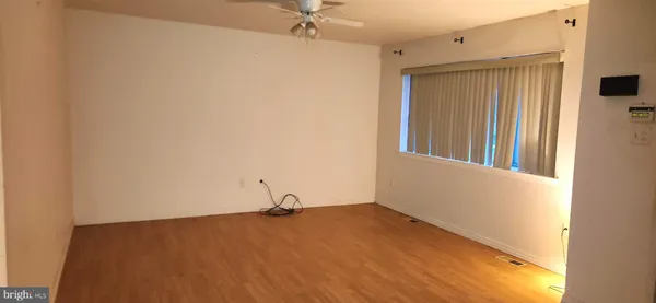 a view of a room with rack on the wall