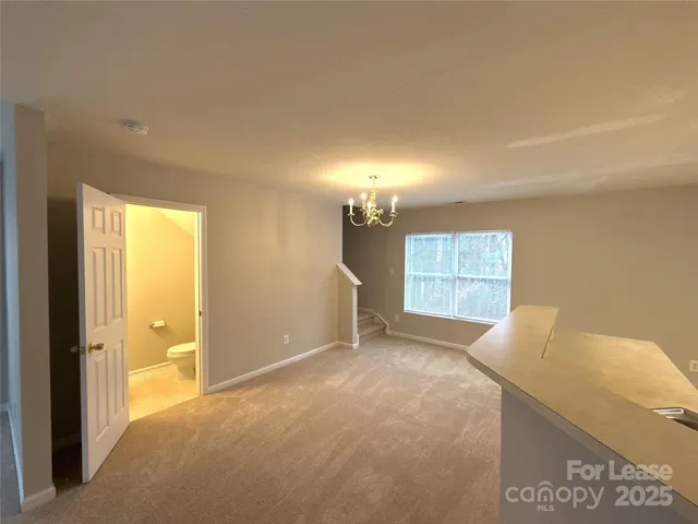 a view of empty room with a window