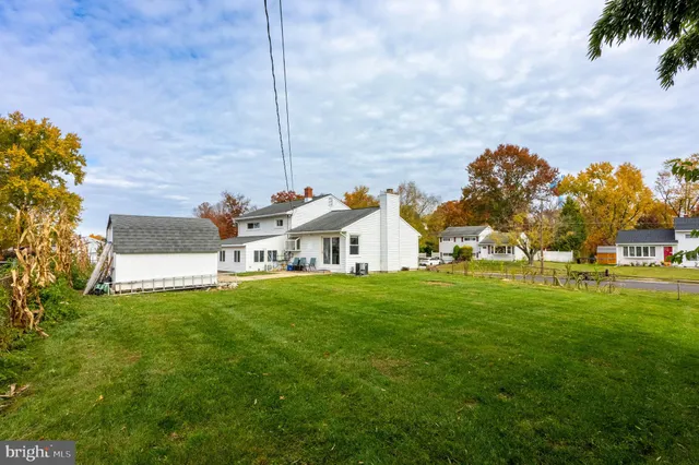 a view of a house with a big yard