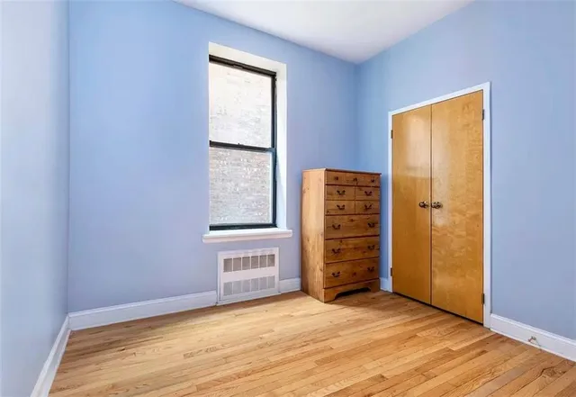 an empty room with a door