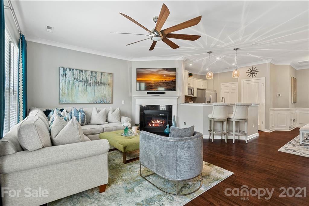 921 Wicawa Road, Unit 309 Fort Mill, SC 29708 - Photo 11 of 28 a living room with furniture and a fireplace