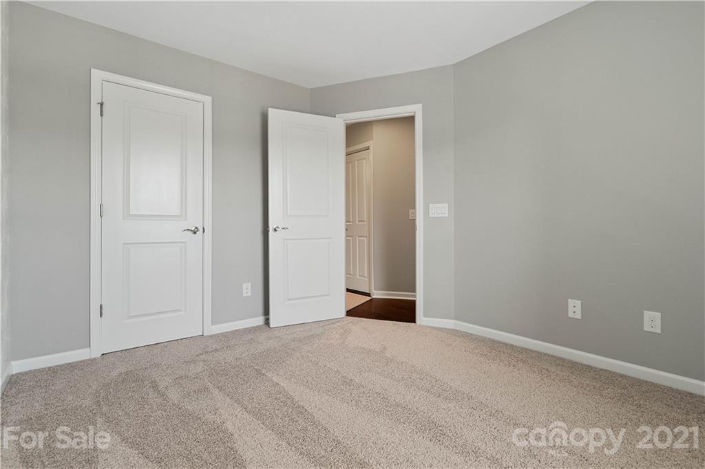 921 Wicawa Road, Unit 309 Fort Mill, SC 29708 - Photo 22 of 28 a view of an empty room