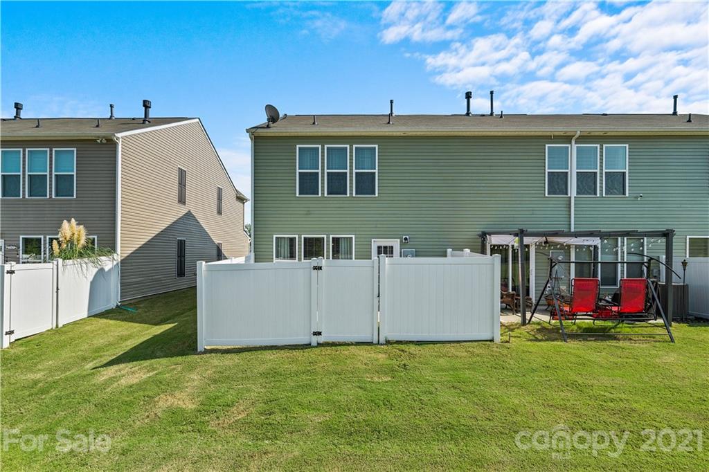 921 Wicawa Road, Unit 309 Fort Mill, SC 29708 - Photo 25 of 28 a view of a house with a outdoor space