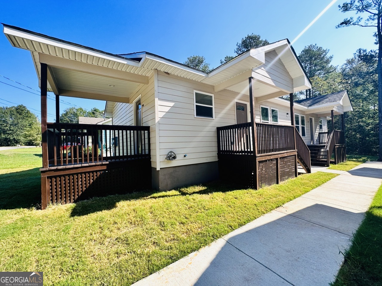 459 Merrywood Drive, Unit B LaGrange, GA 30241 - Photo 1 of 15 a view of a house with a wooden fence