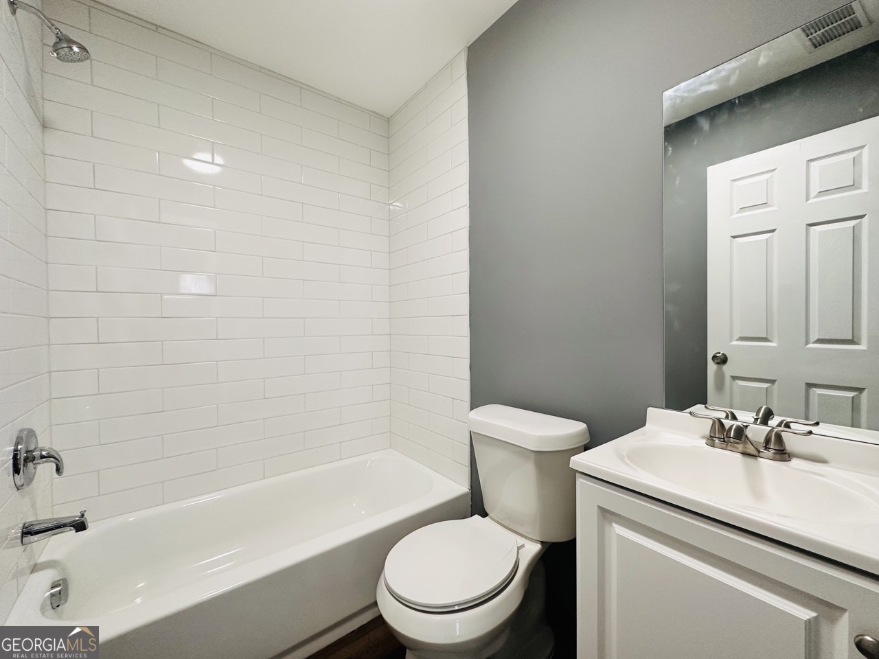 459 Merrywood Drive, Unit B LaGrange, GA 30241 - Photo 14 of 15 a bathroom with a sink a toilet and a bathtub