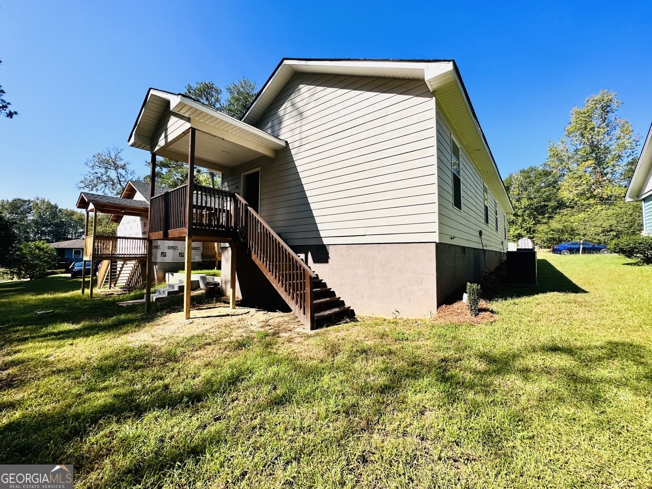 459 Merrywood Drive, Unit B LaGrange, GA 30241 - Photo 15 of 15 a view of a house with backyard and sitting area