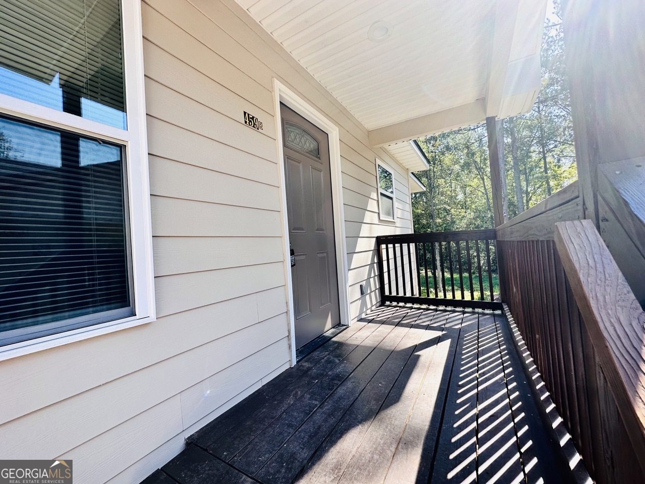 459 Merrywood Drive, Unit B LaGrange, GA 30241 - Photo 4 of 15 a view of a balcony with wooden floor