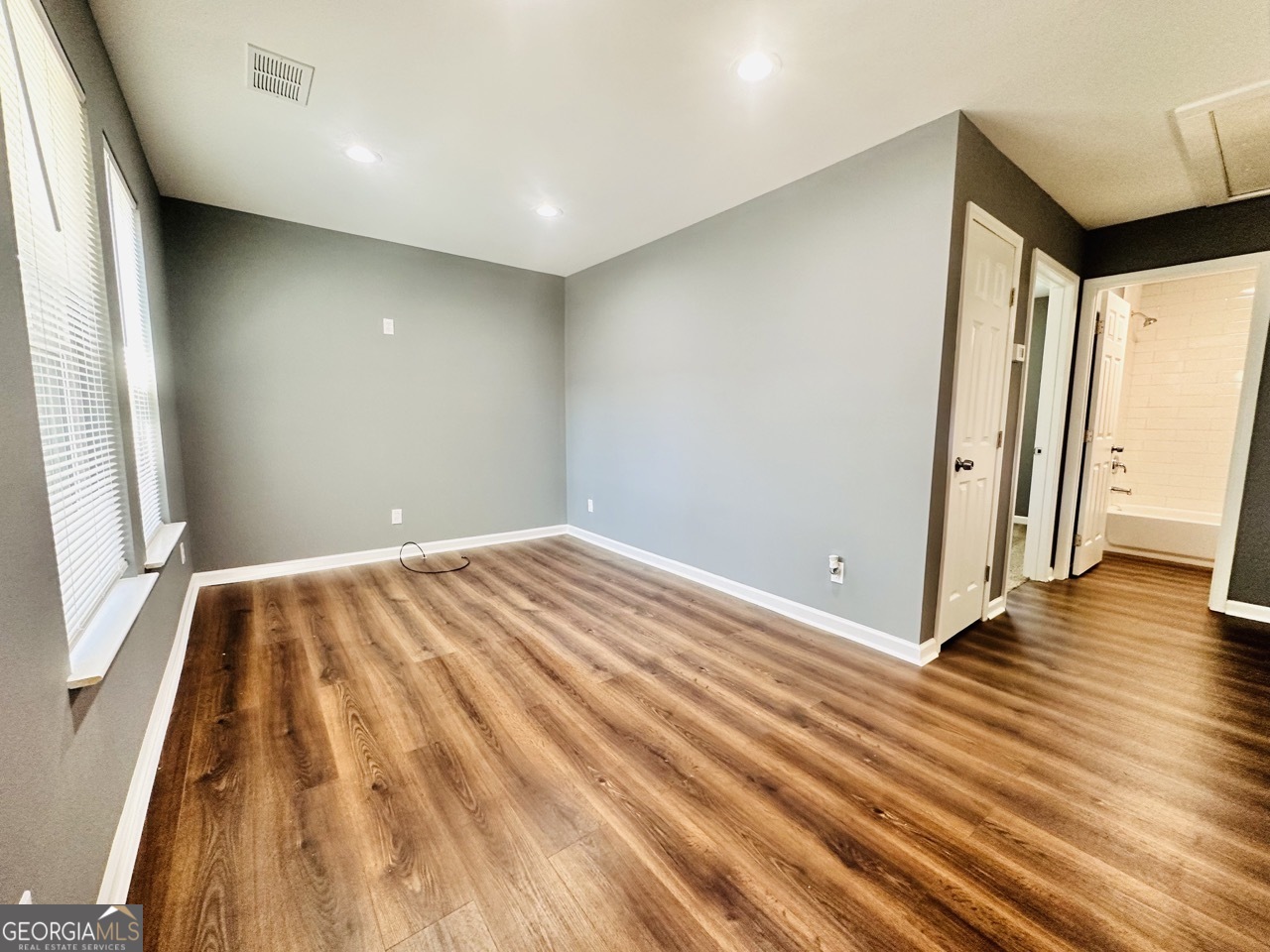 459 Merrywood Drive, Unit B LaGrange, GA 30241 - Photo 6 of 15 a view of empty room with wooden floor