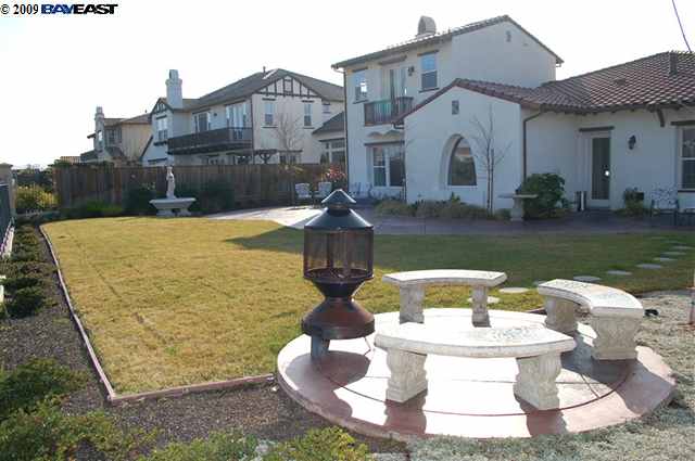 5505 Satinleaf Way San Ramon, CA 94582 - Photo 1 of 1 a view of a white house with a yard potted plants