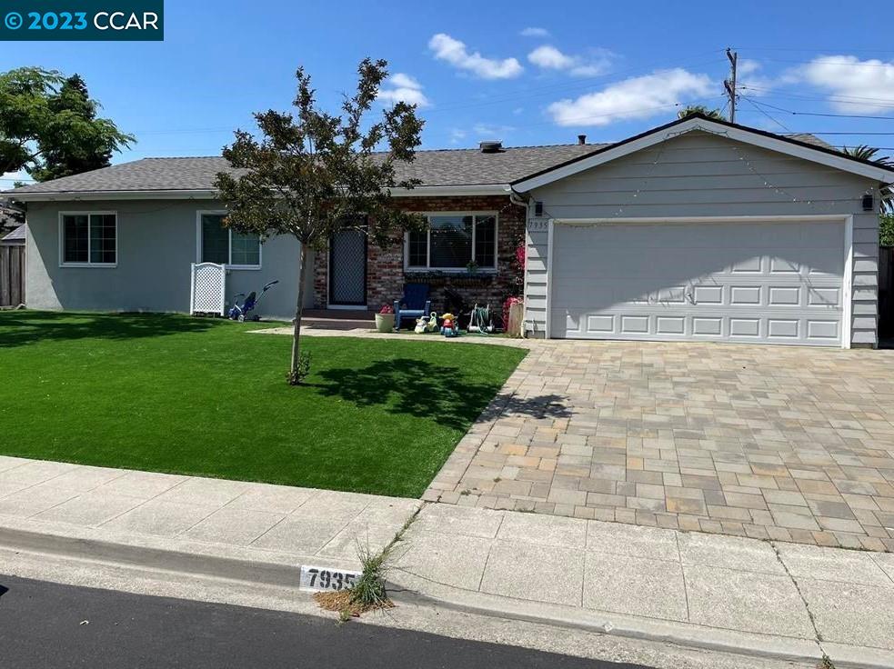 7935 Countess Court Dublin, CA 94568 - Photo 1 of 1 a front view of a house with a yard and garage