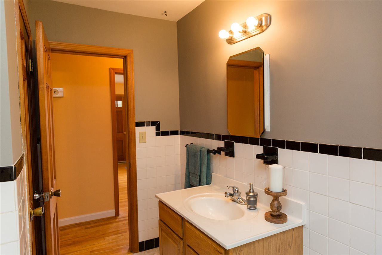 739 Middlebrook Road Staunton, VA 24401 - Photo 23 of 30 a bathroom with a sink a mirror and a shower