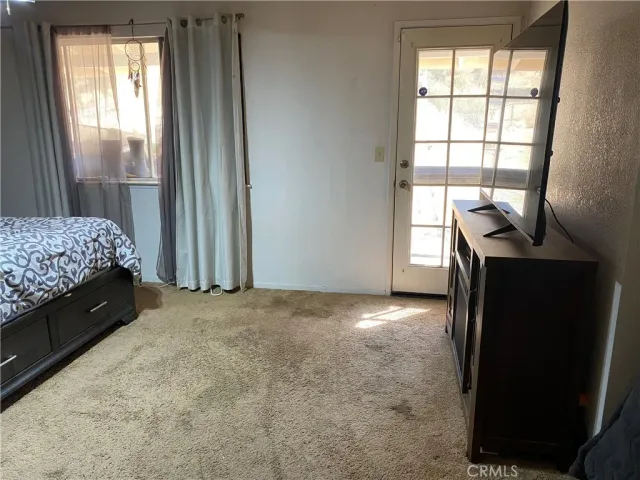 a view of livingroom with hardwood floor and a window