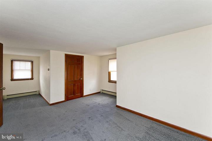 1610 South Loudoun Street Winchester, VA 22601 - Photo 22 of 38 an empty room with windows