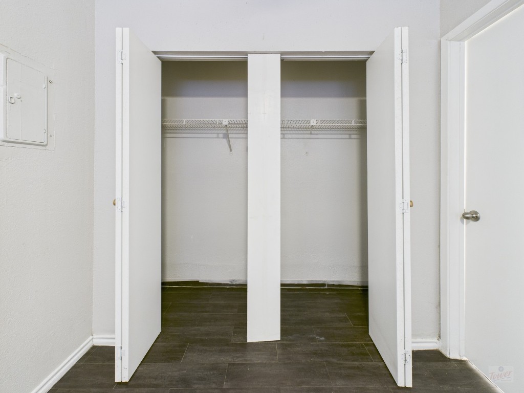 1840 Burton Drive, Unit 141 Austin, TX 78741 - Photo 20 of 24 a view of empty room with wooden floor