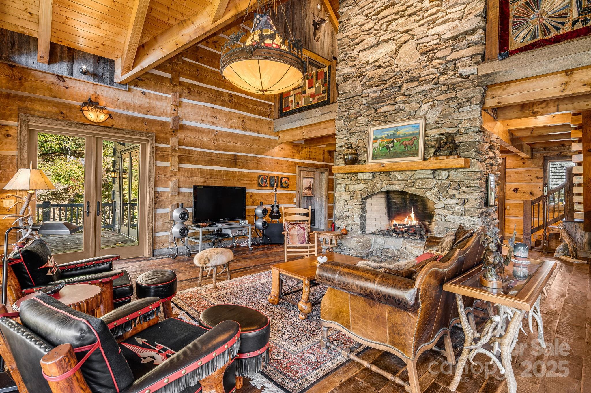 99 Thistle Ridge Canton, NC 28716 - Photo 11 of 48 a outdoor space with furniture and a fireplace