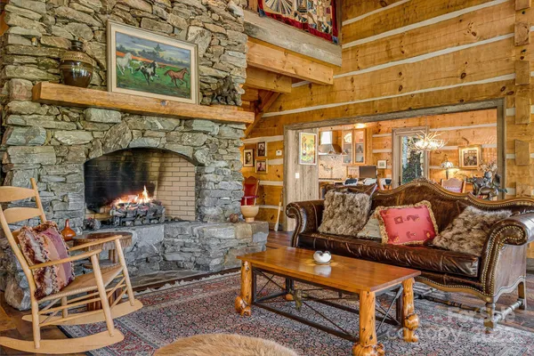 a outdoor living space with patio furniture and a fireplace