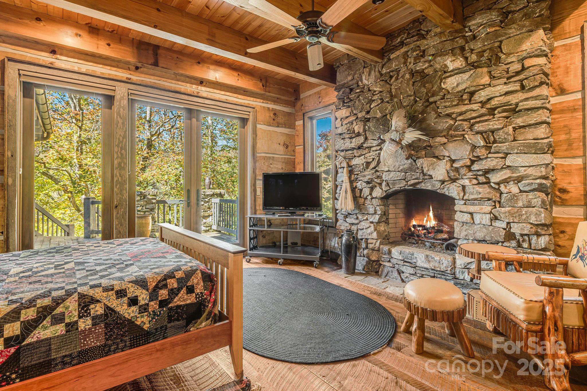 99 Thistle Ridge Canton, NC 28716 - Photo 18 of 48 a view of a livingroom with furniture and a fireplace