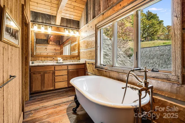 a bathroom with a sink and shower