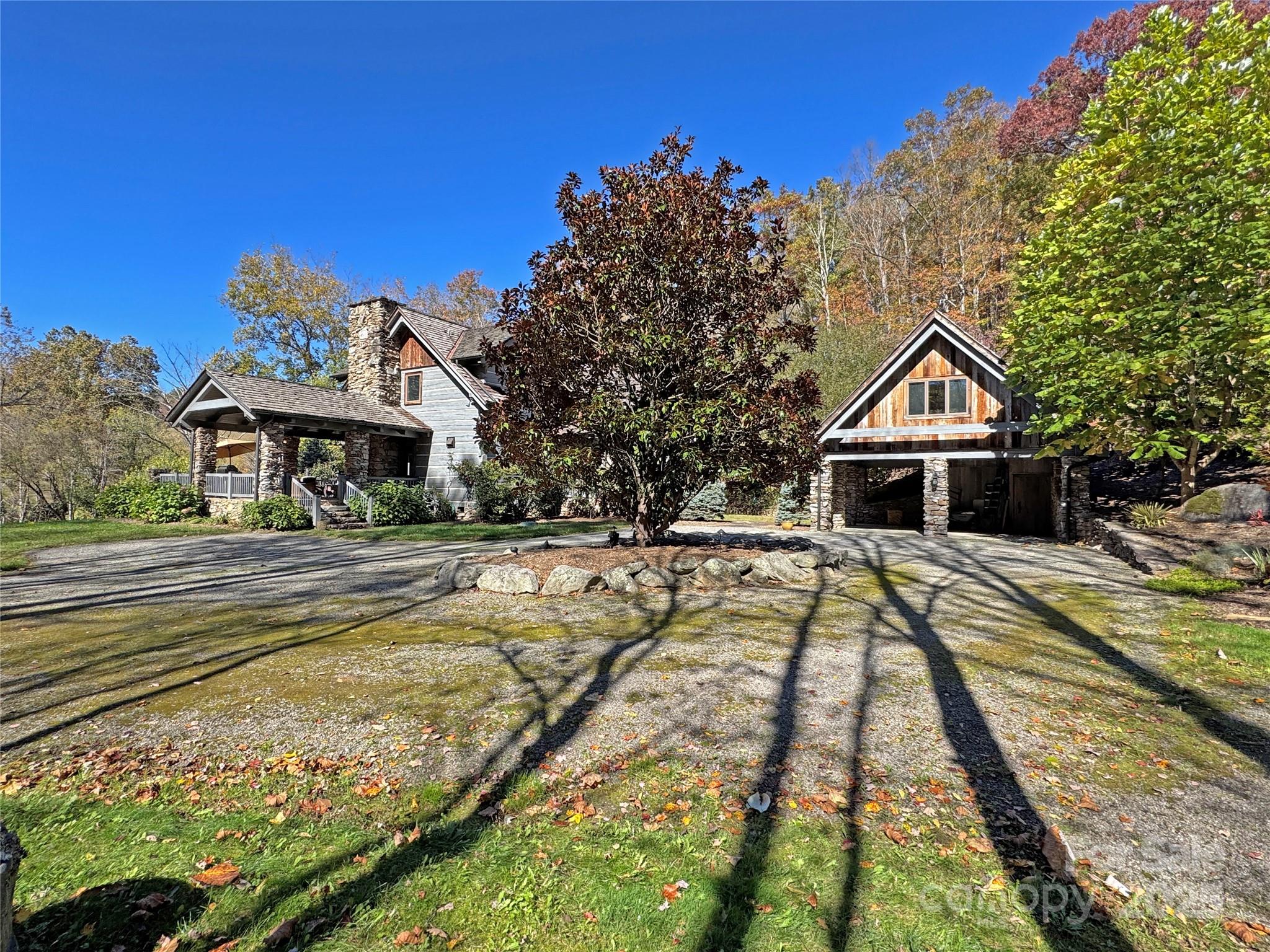 99 Thistle Ridge Canton, NC 28716 - Photo 47 of 48 a view of house with outdoor space and swimming pool