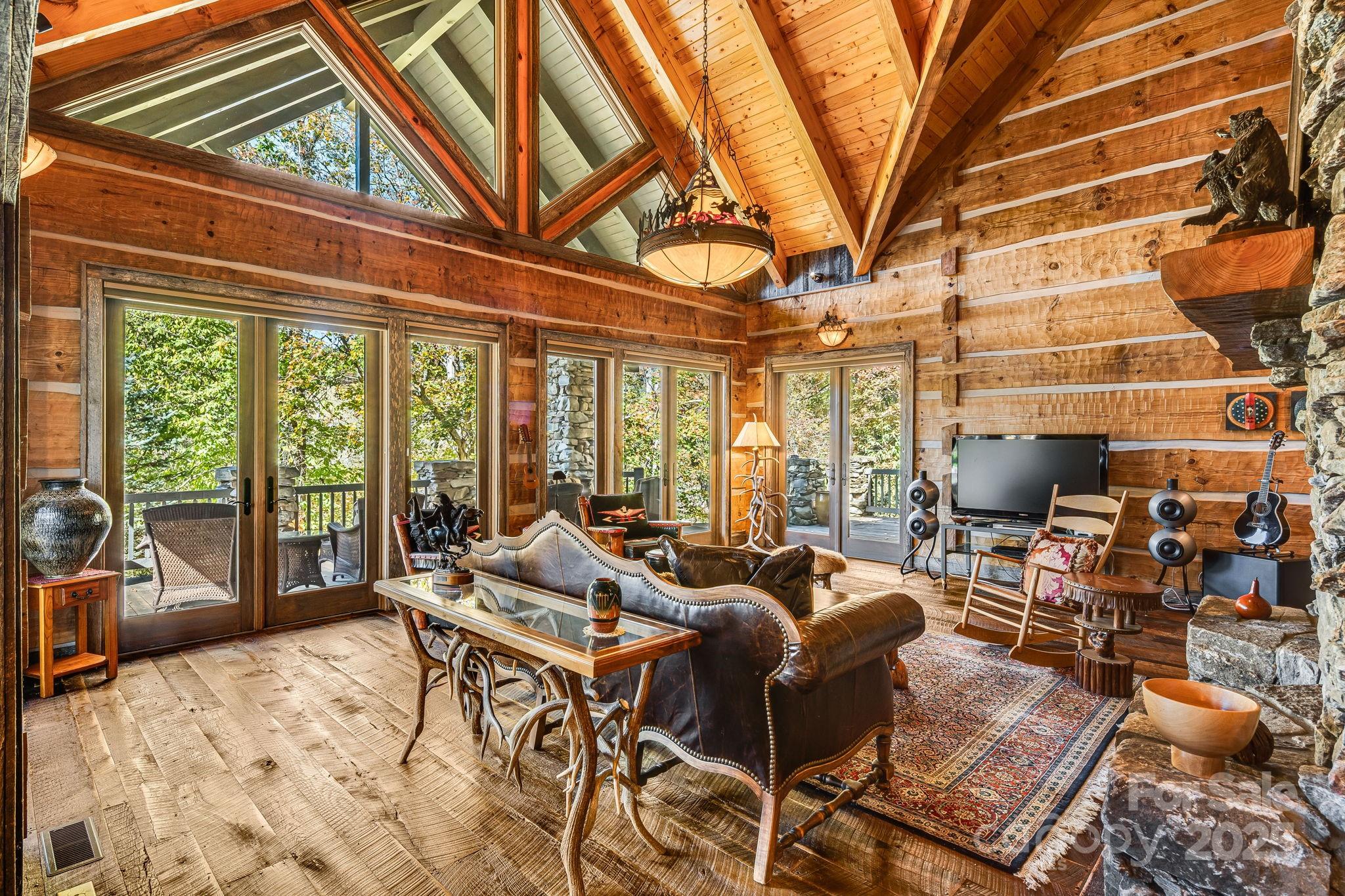 99 Thistle Ridge Canton, NC 28716 - Photo 10 of 48 a living room with furniture and a large window