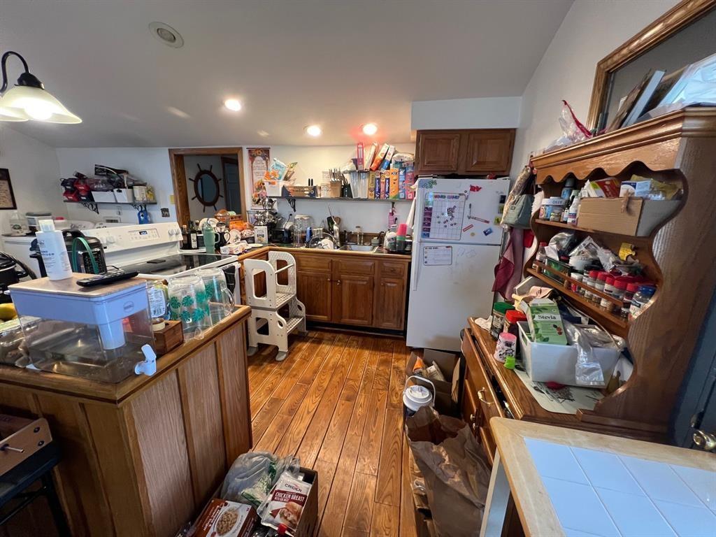 13478 Old Lake Road, Unit 63 East Springfield, PA 16411 - Photo 6 of 18 a view of a room with gym equipment