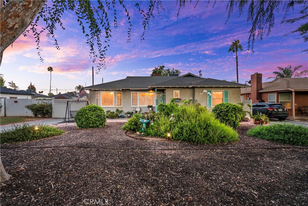 4150 Emerson Street Riverside, CA 92506 - Photo 1 of 1 a front view of a house with garden