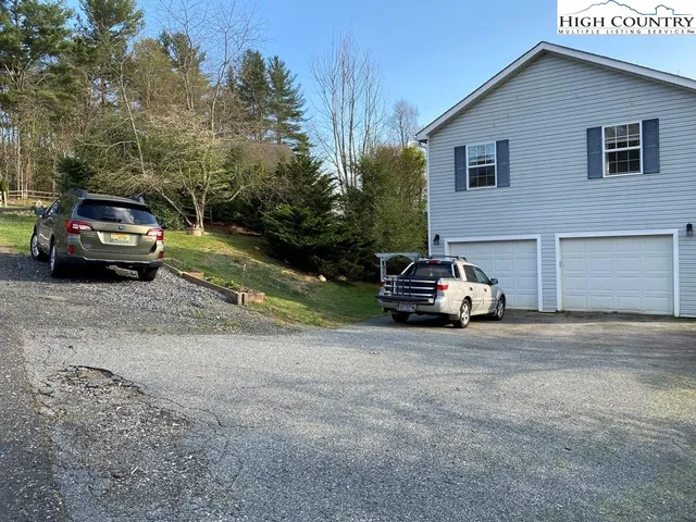 a car parked in front of a house