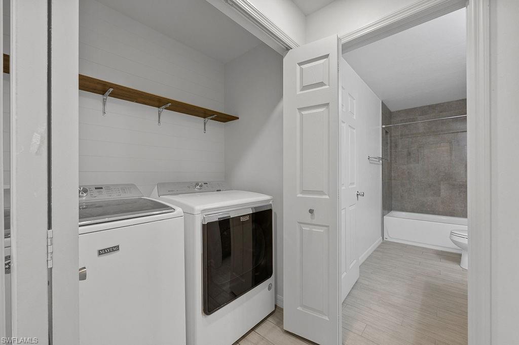 3429 Southwest 8th Place Cape Coral, FL 33914 - Photo 10 of 19 a utility room with dryer and washer