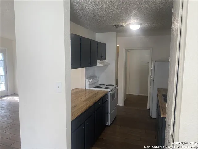 a view of storage and utility room