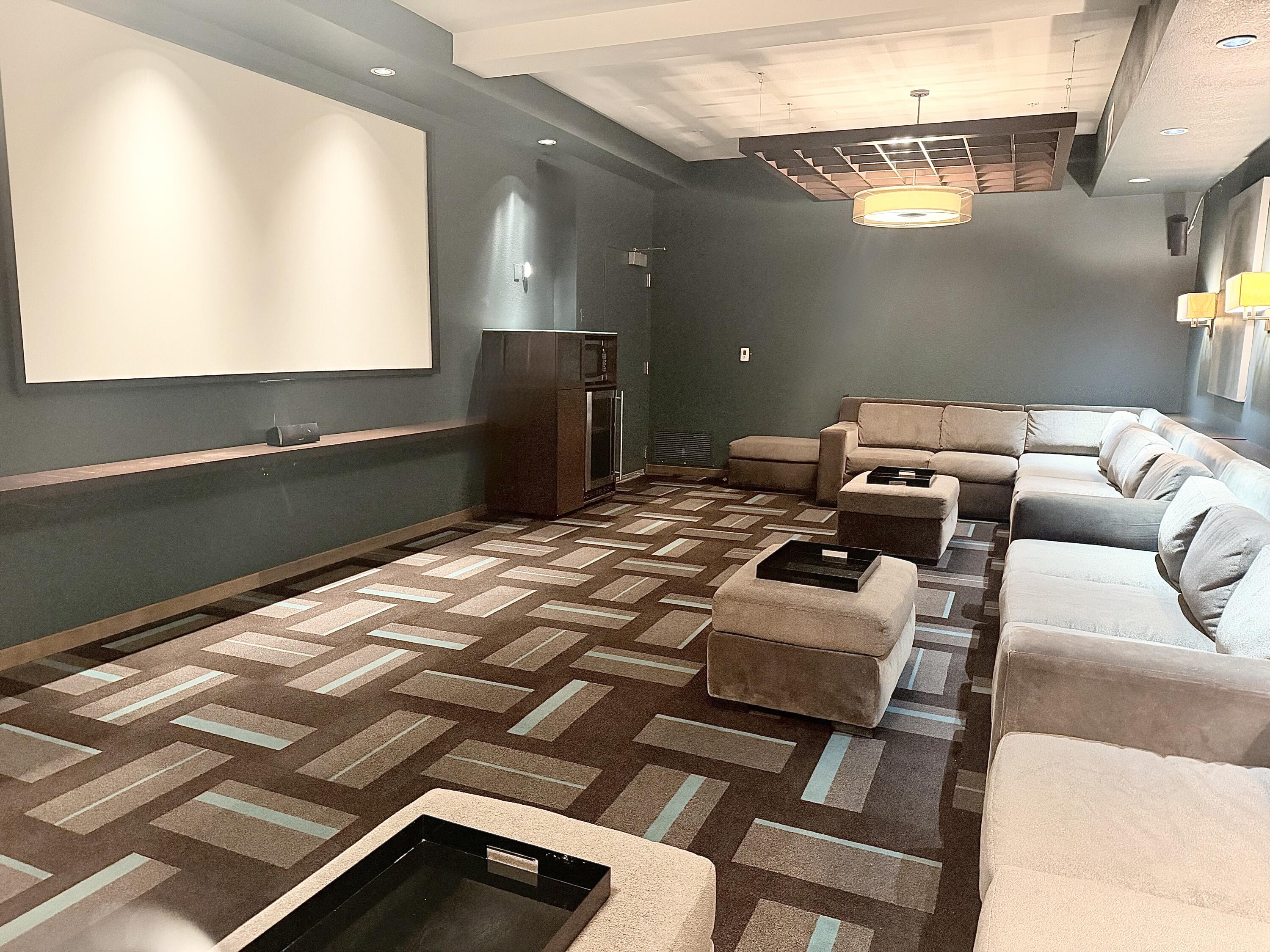 106 West Seeboth Street, Unit 820 Milwaukee, WI 53204 - Photo 14 of 16 Community Amenity: Theatre Room