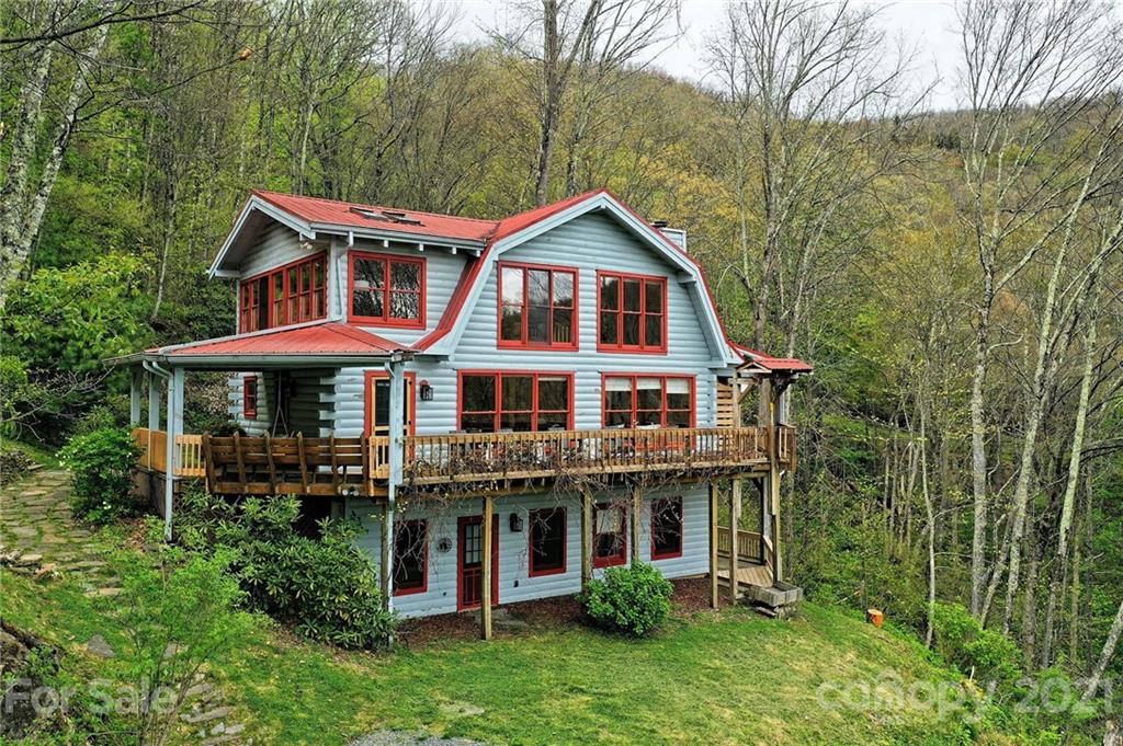 1933 Laurel Ridge North Maggie Valley, NC 28751 - Photo 2 of 44 a view of a house with yard and sitting area