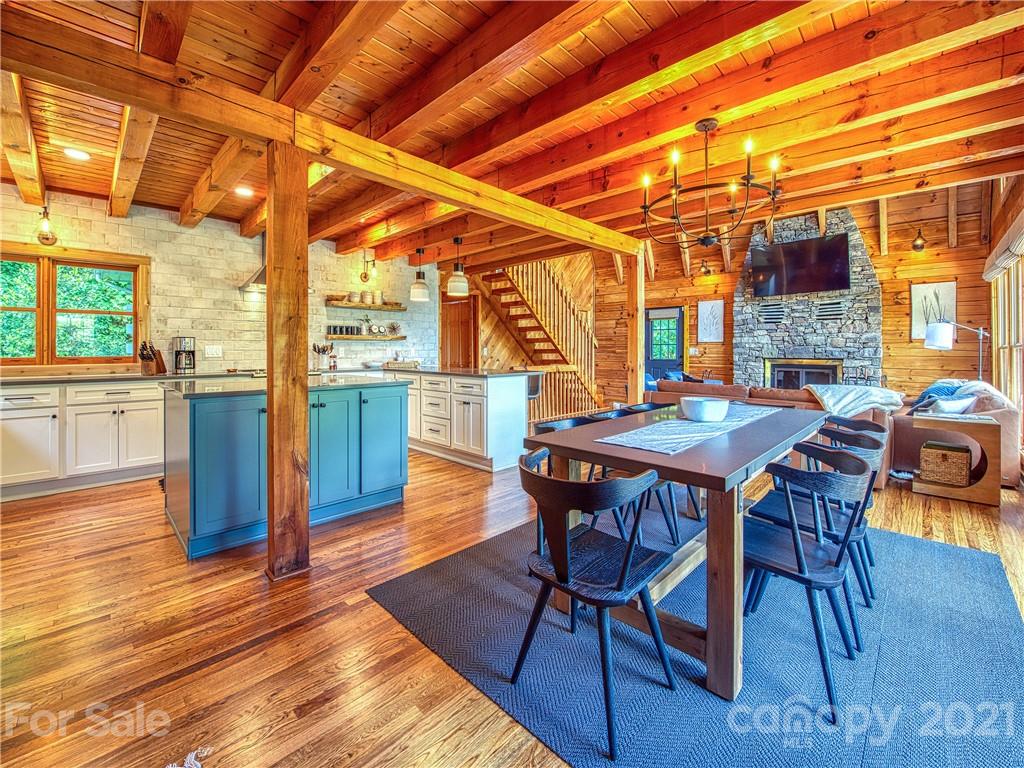 1933 Laurel Ridge North Maggie Valley, NC 28751 - Photo 17 of 44 a view of a dinning table and chairs in the patio