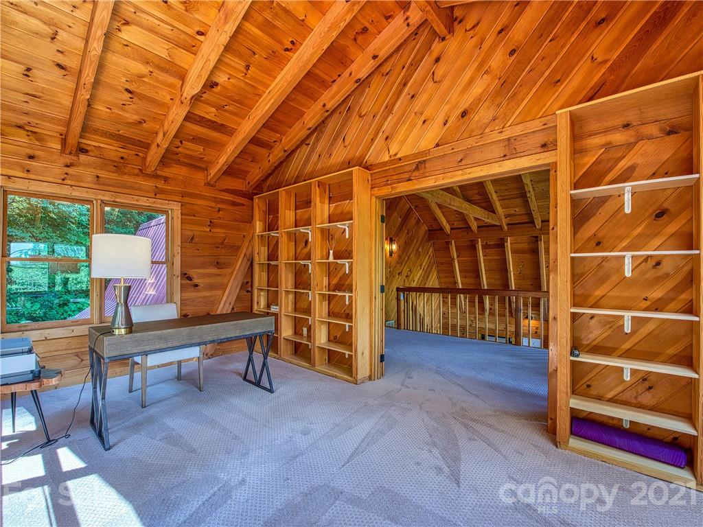 1933 Laurel Ridge North Maggie Valley, NC 28751 - Photo 20 of 44 a view of a room with wooden floor and windows