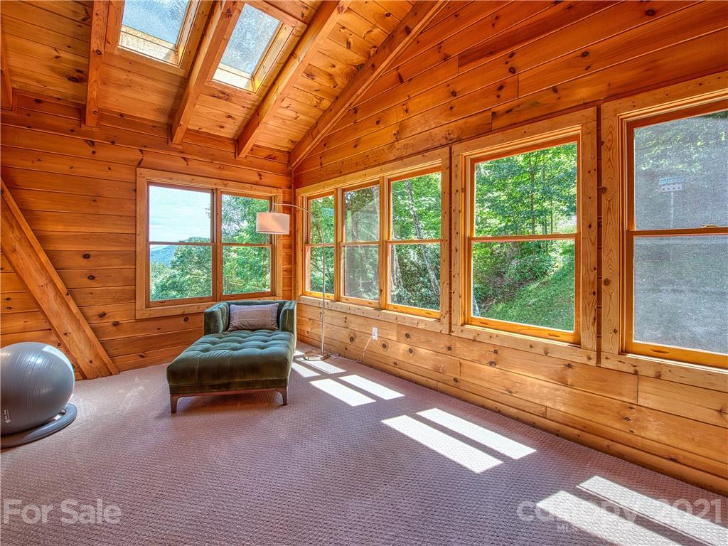 1933 Laurel Ridge North Maggie Valley, NC 28751 - Photo 21 of 44 a living room with furniture and a large window