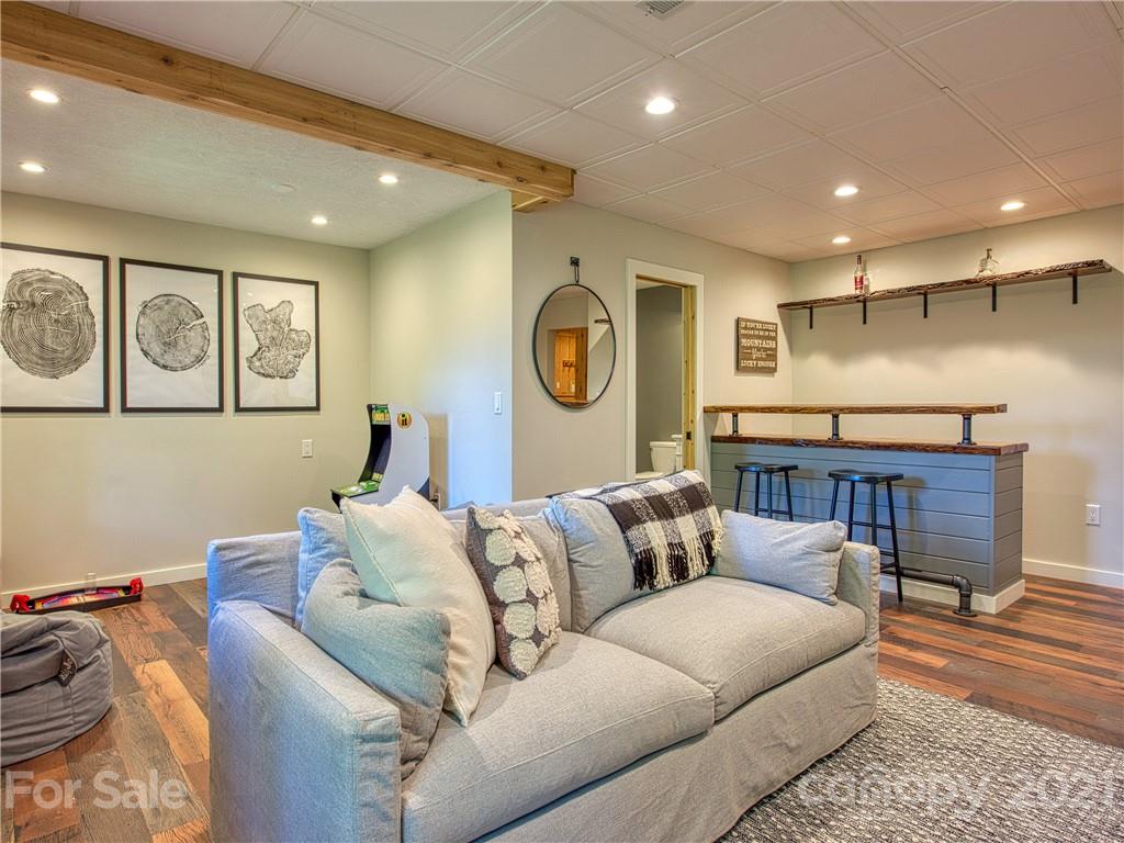 1933 Laurel Ridge North Maggie Valley, NC 28751 - Photo 33 of 44 a living room with furniture and kitchen view